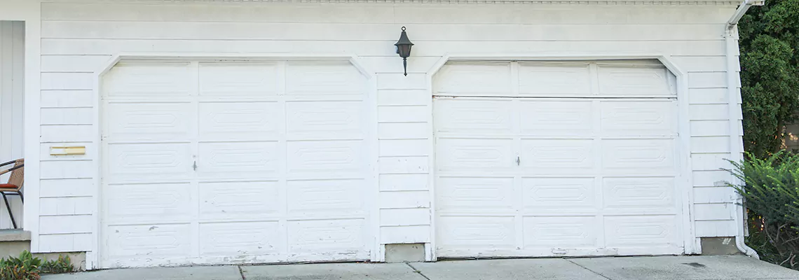 Roller Garage Door Dropped Down Replacement in Palm Bay, FL